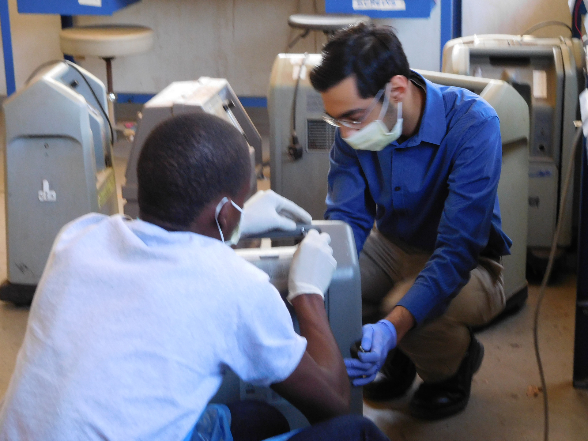 Repairing an oxygen concentrator at Kamuzu Central Hospital in Lilongwe, Malawi.